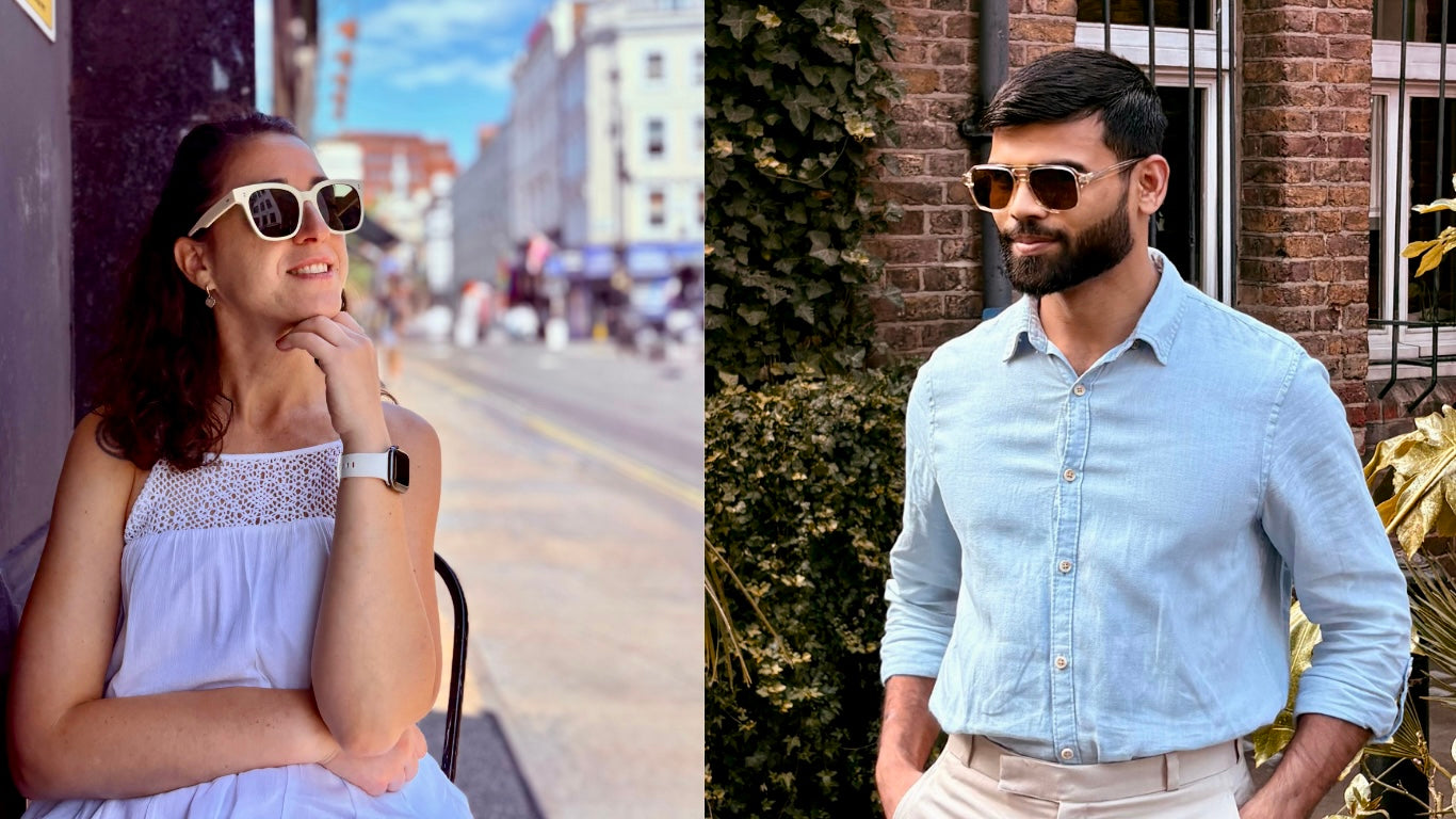 Woman in sunglasses and white dress sitting outdoors, man in light blue shirt and sunglasses standing outdoors.